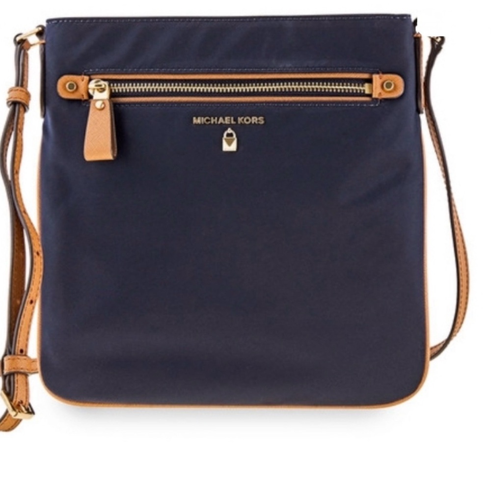 Michael Kors Dark Blue Crossbody Bag with Tan Accents
Never used!